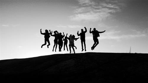 kids jumping in the air at the same time 